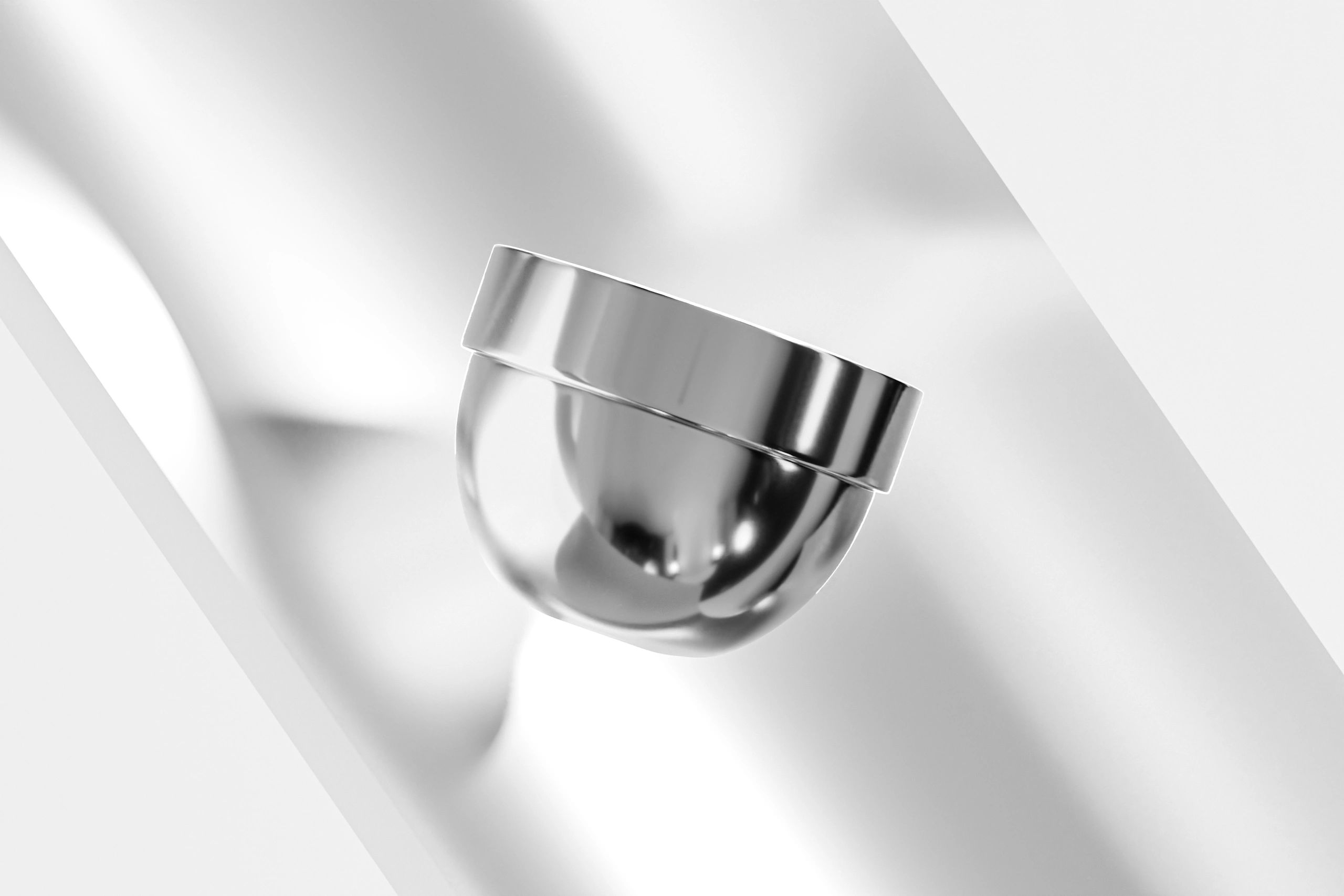 Chrome-finish metallic container with glossy electroplated lid